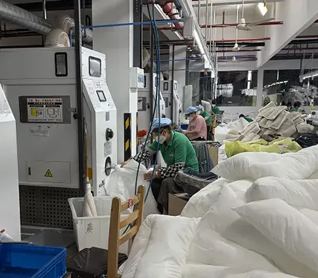 Fiber filling station for large dog bed production