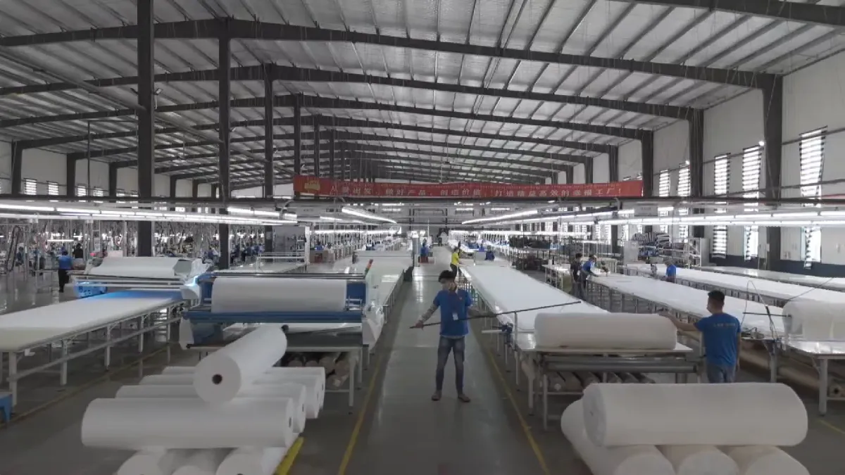 Fabric cutting process for OEM dog bed production at our Cambodia factory